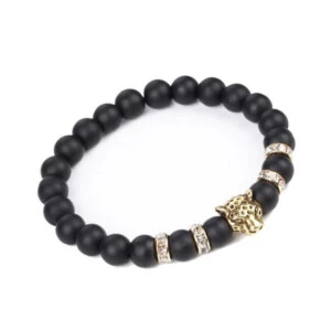 Handgjort armband courage leopard guld m. Svarta stenar